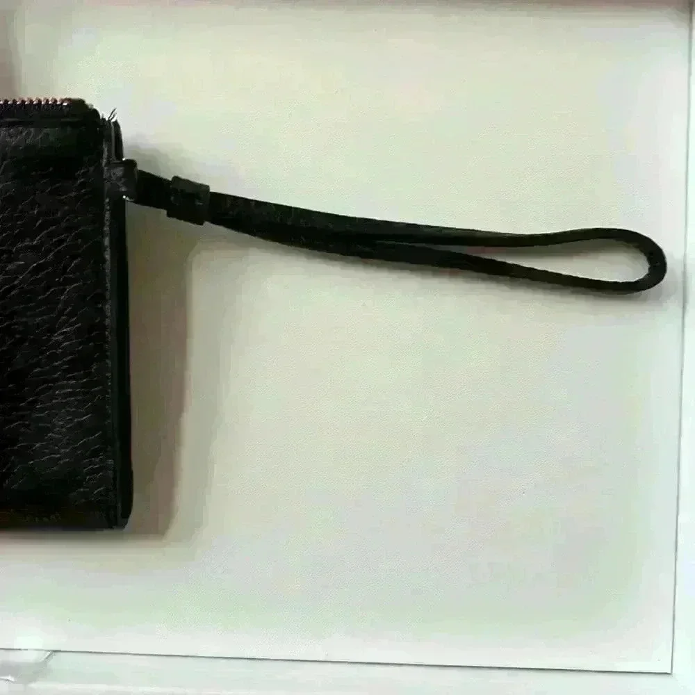 Vintage new with tags Kate Spade north court bow wristlet in black